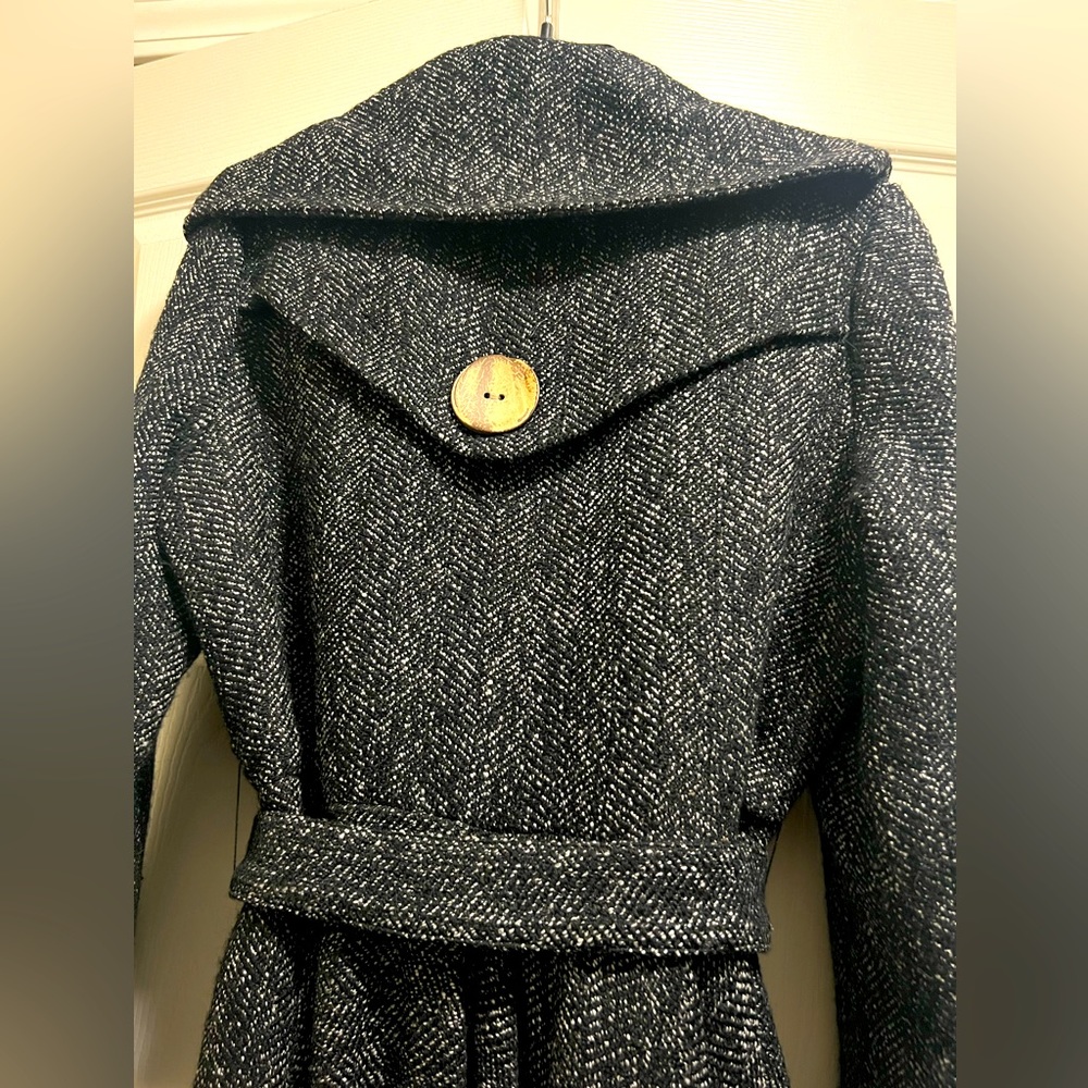 High lo dress coat. You can dress it up or down with some jeans.